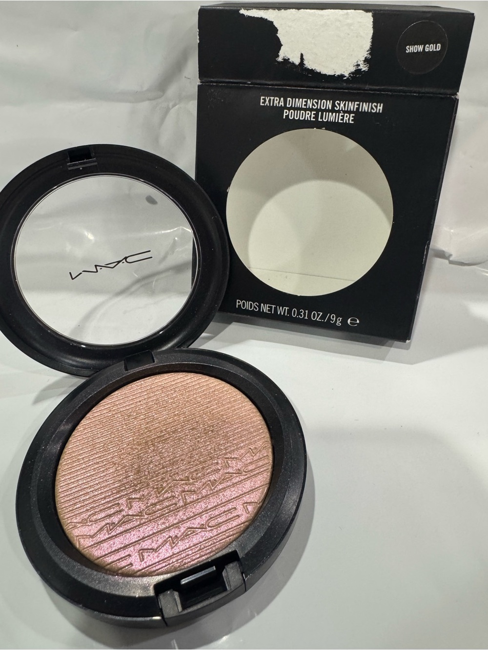 MAC Cosmetics Highlighter Compact in Pink-Gold Shimmer show gold